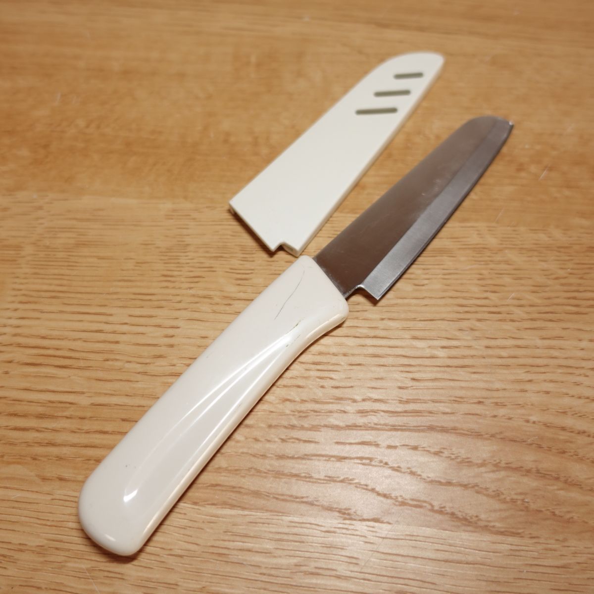 KAI Petty Knife, geschärft, Obstmesser, Edelstahl, mit Scheide, zweischneidig